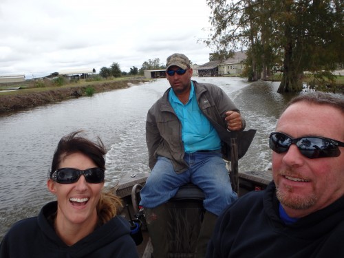 dave wendy paul in boat in bayou